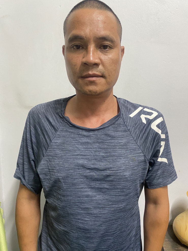 Trần Quang Thìn tại trụ sở công an.