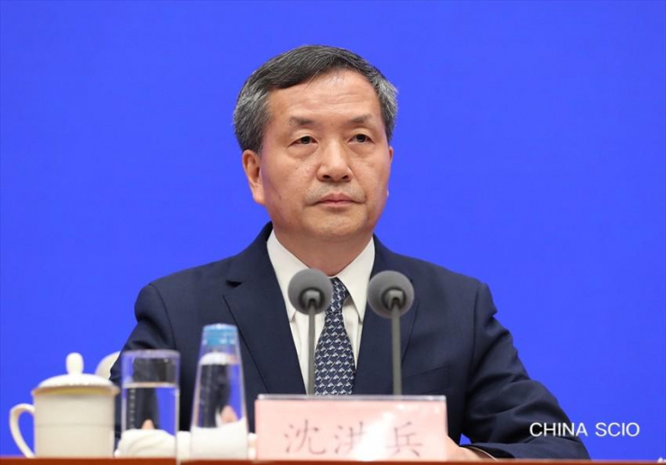Giám đốc Trung tâm Kiểm soát và Phòng ngừa dịch bệnh Trung Quốc (CDC) - ông Thẩm Hồng Băng trong cuộc họp báo hôm 8-4. Ảnh: Xu Xiang/China SCIO