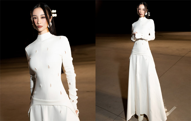 Diện váy dáng dài All-White thuộc BST “Figure", Jun Vũ chứng tỏ khả năng biến hoá đa dạng cùng gout thời trang thời thượng. Với một chiếc váy kín đáo, nữ diễn viên vẫn cuốn hút lạ thường, đồng thời khoe được vóc dáng mảnh mai và đường cong cơ thể mà không cần đến bất cứ chi tiết cut-out, hở hang nào.&nbsp;&nbsp;Layout make-up cùng kiểu tóc chuẩn “nàng thơ” của Jun Vũ là vũ khí giúp cô ấn tượng hơn so với model lookbook.