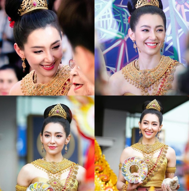 Bella Ranee&nbsp;"gây sốt" với vẻ đẹp kiêu sa, tóc búi cao, cài vương miện và&nbsp;tông trang điểm ngọt ngào khi hóa thân thành "nữ thần Nang Thungsa" trong lễ hội Songkran.