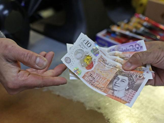 Nhà in tiền giấy lớn nhất thế giới cho biết việc in tiền không còn mang lại nhiều lợi nhuận nữa (ảnh: Susannah Ireland/AFP/Getty).