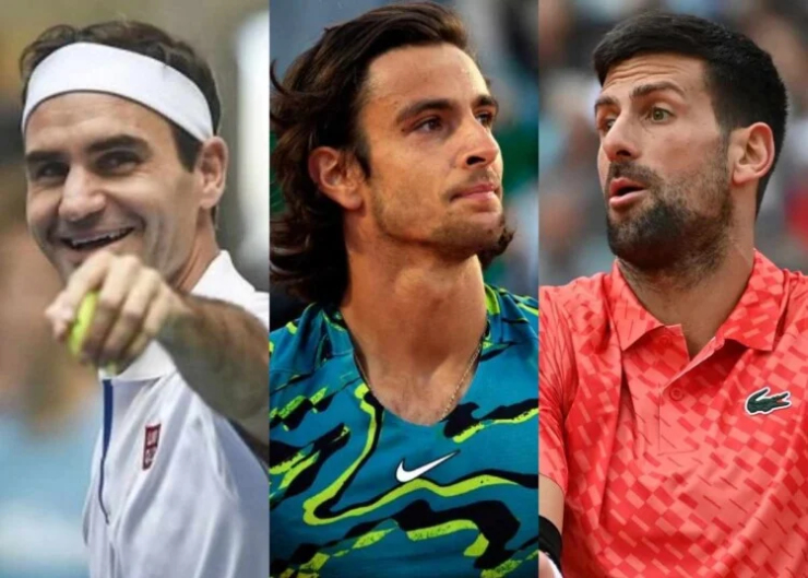 Musetti (áo xanh) tôn vinh Federer (áo trắng) vĩ đại nhất lịch sử tennis