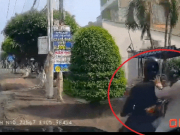 Tin tức ô tô - Clip: Lái ôtô ép hai tên cướp đi xe máy bắn lên cây cảnh