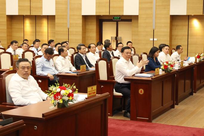 Bí thư Thành ủy Hà Nội Đinh Tiến Dũng và Chủ tịch UBND TP Hà Nội Trần Sỹ Thanh dự phiên chất vấn