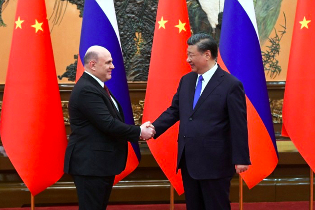 Thủ tướng Nga Mikhail Mishustin trong cuộc hội kiến Chủ tịch Trung Quốc Tập Cận Bình ngày 24/5. (Ảnh: Sputnik)