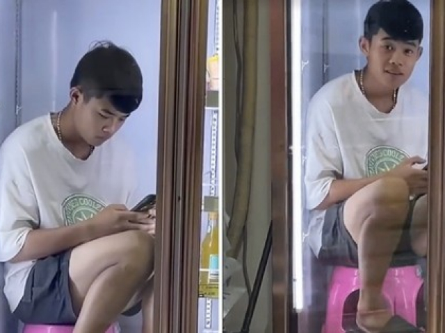Không chịu nổi nắng nóng, nam thanh niên chui vào tủ lạnh ngồi chơi điện thoại