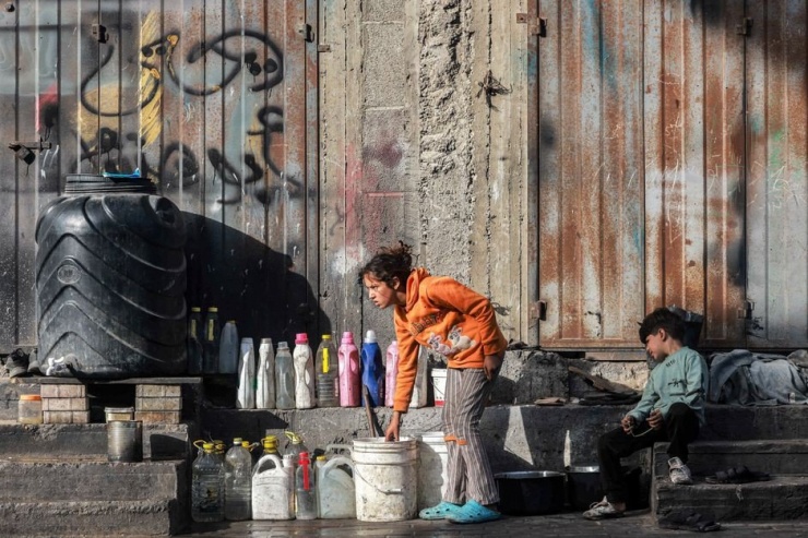 Người dân ở TP Rafah (nam Gaza). Ảnh: AFP