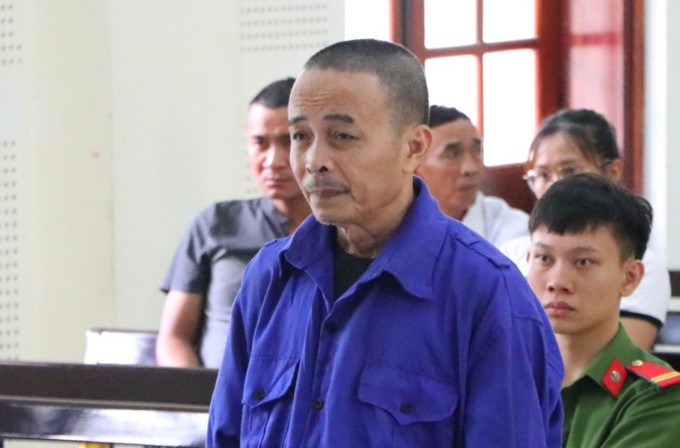 Bị cáo Minh tại tòa, ngày 9/5. Ảnh: Hùng Lê