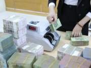 Kinh doanh - Lãi suất tăng, tiền vẫn chưa trở lại ngân hàng