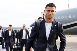 Bóng đá - Cơn sốt Ronaldo: Siêu sao bảnh bao đến Đức, được 300 người hộ tống về khách sạn