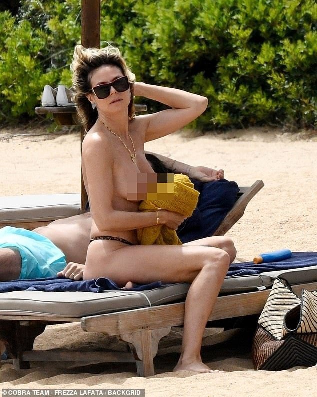 Heidi Klum cởi bikini để tắm nắng gây tranh cãi - 10