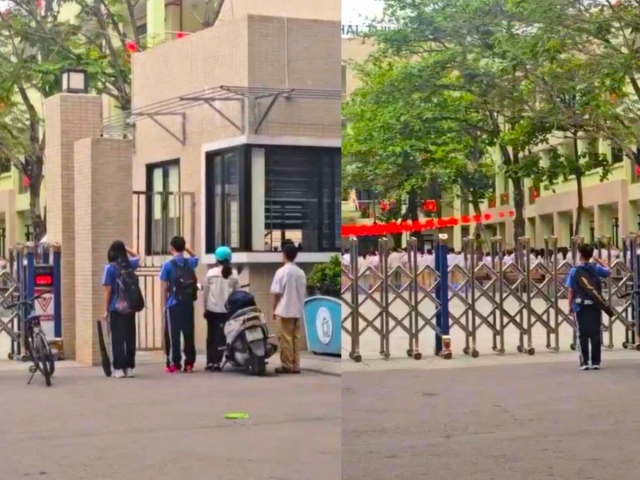 Đi học muộn, nhóm học sinh đứng nghiêm chào cờ rồi mới xin bảo vệ vào trường