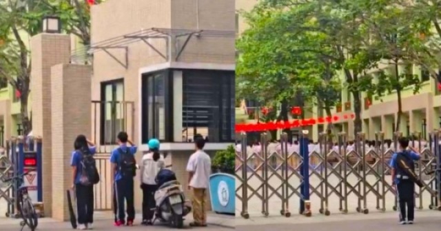 Đi học muộn, nhóm học sinh đứng nghiêm chào cờ rồi mới xin bảo vệ vào trường