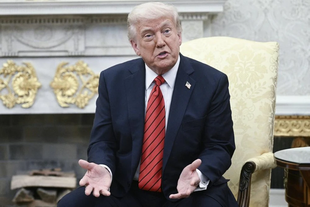 Tổng thống Mỹ Donald Trump trả lời báo giới ở Nhà Trắng ngày 17-4. Ảnh: AFP