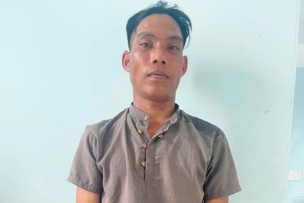 Nghi phạm Đinh Tóc khi bị bắt giữ. Ảnh: DH.