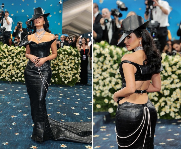 Giữa hàng trăm nghệ sĩ xúng xính trang phục ấn tượng trên thảm xanh Met Gala năm nay, Kim Kardashian vẫn nổi bật khi diện thiết kế Chrome Hearts chất liệu da cá tính. Không chỉ tôn vinh chủ đề "Superfine: Tailoring Black Style" của đêm hội thời trang lớn nhất hành tinh, xiêm y còn giúp tỷ phú 44 tuổi phô diễn đường cong trứ danh, trong khi phụ kiện hài hòa càng làm tăng sức hút cho tổng thể.