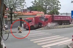 Clip: Cô gái dùng  lăng ba vi bộ  né xe hai tải đâm nhau ngay trước mặt