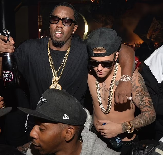 Justin Bieber và Diddy trong một buổi tiệc ở Atlanta năm 2014. Ảnh: FilmMagic