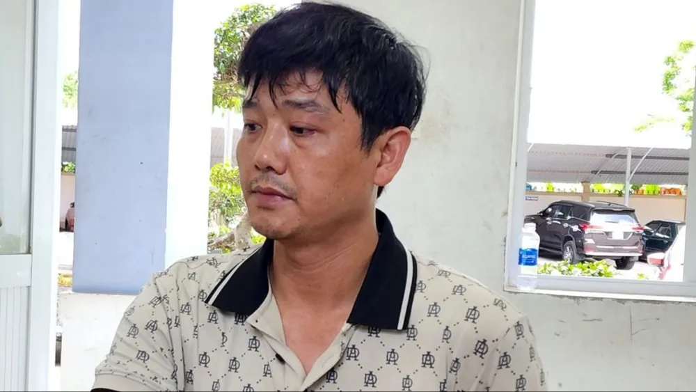 Dương Ngọc Duy - nghi can cướp ngân hàng tại công an. Ảnh: T.Trung