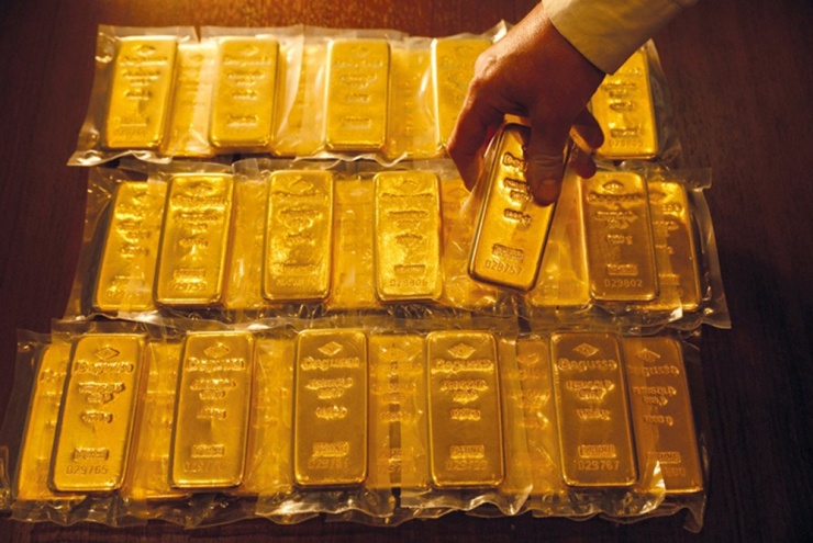 Giá vàng tăng cao, USD lao dốc. Ảnh: UN