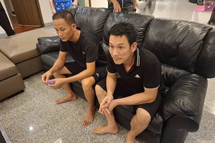 Hai vệ sĩ của Ngo Thi Theu bị bắt. Ảnh: Bangkok Post