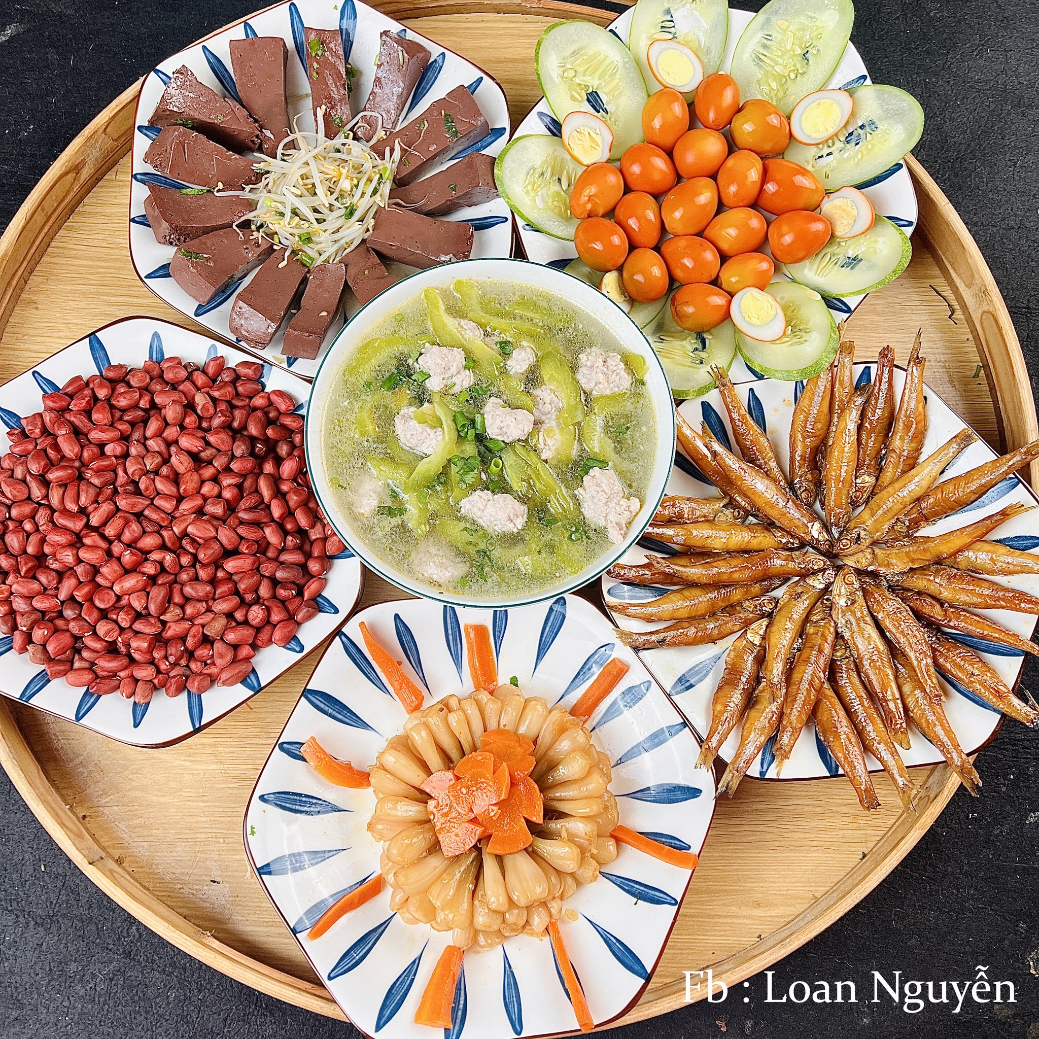 Cá cơm rim - Kiệu muối - Lạc đỏ - Tiết xào giá - Salad - Canh khổ qua nấu thịt viên
