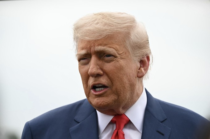 Tổng thống Trump trả lời phóng viên tại thủ đô Washington ngày 8/6. Ảnh: AFP