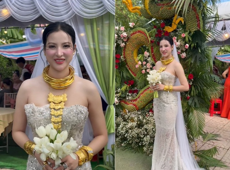 Cô dâu xinh đẹp trong váy cưới trắng. Nguồn (ảnh cắt từ clip)