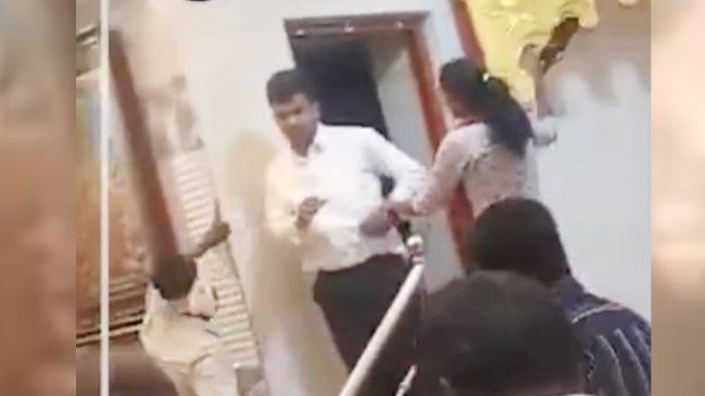 Người đàn ông bị vợ đánh tới tấp khi bí mật kết hôn với người khác.