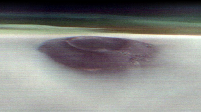 Hình ảnh ngoạn mục cho thấy đỉnh của núi lửa Arsia Mons nhô ra từ mây - Ảnh: NASA