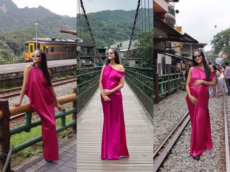 H'Hen Niê chọn váy áo gam màu tươi sáng như hồng, vàng, cam trong chuyến du lịch. Trong ngày đầu, mỹ nhân diện đầm lụa lệch vai, đi giày bệt, đeo mắt kính khi ghé thăm nhiều địa điểm nổi tiếng.