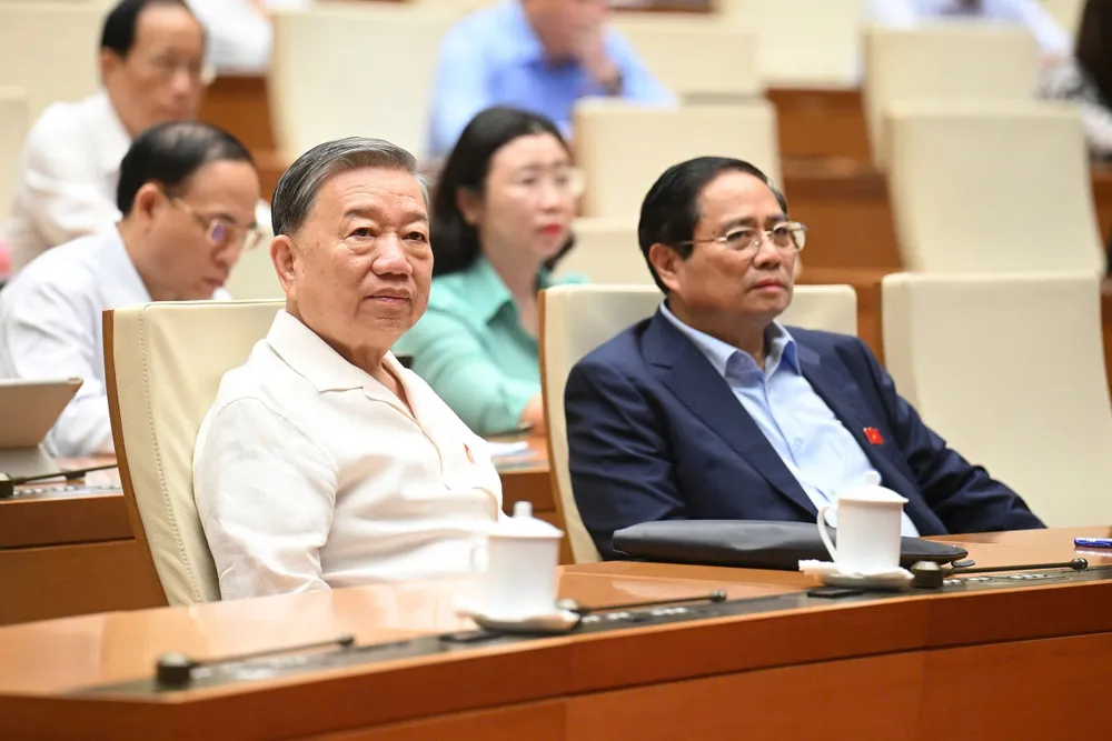 Tổng Bí thư Tô Lâm, Thủ tướng Phạm Minh Chính tại phiên chất vấn. Ảnh: PHẠM THẮNG