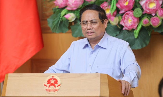 Thủ tướng Phạm Minh Chính chủ trì họp về chính quyền địa phương 2 cấp, tối 20/6. Ảnh: Nhật Bắc