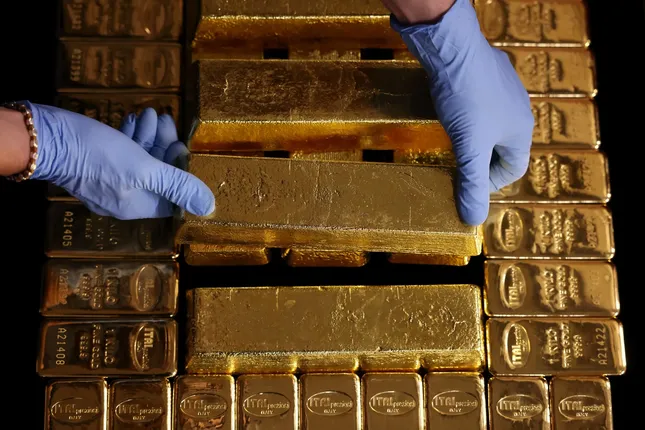 Giá vàng thế giới đã tăng vọt ngay sau khi Mỹ tham chiến tại Trung Đông. Ảnh: Bloomberg.