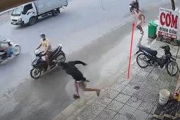 Thanh niên cầm gậy rượt đuổi kẻ trộm xe máy