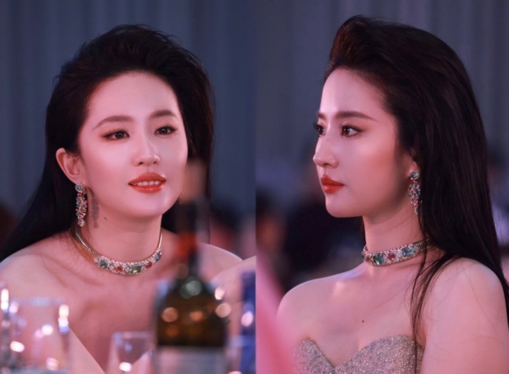Kiểu tóc vuốt ngược ra sau giúp cô trông thanh lịch và tao nhã.