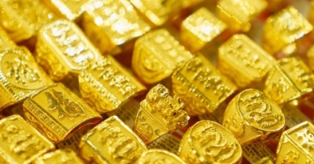 Giá vàng thế giới rơi thẳng đứng, giảm gần 100 ...