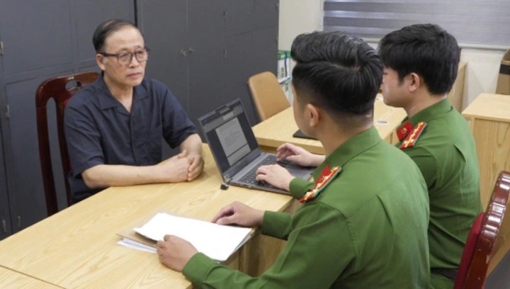 Ông Vũ Minh Châu tại cơ quan công an.