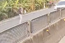 Tài xế dừng xe giữa quốc lộ cứu bé gái, CSGT lên tiếng