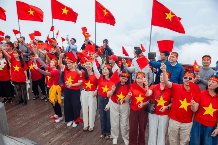 Kỳ nghỉ 5 ngày giúp người lao động có dịp nghỉ ngơi, tái tạo sức lao động. Ảnh: TTXVN.