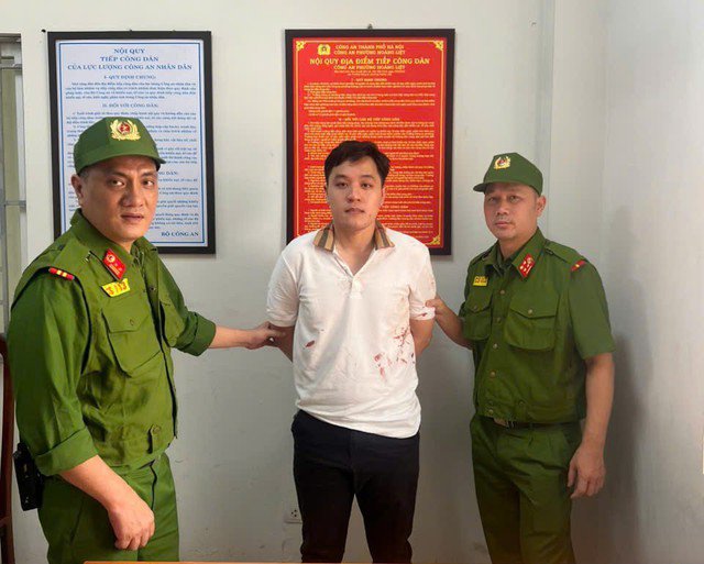 Đối tượng Phạm Hoàng Dũng tại cơ quan Công an.