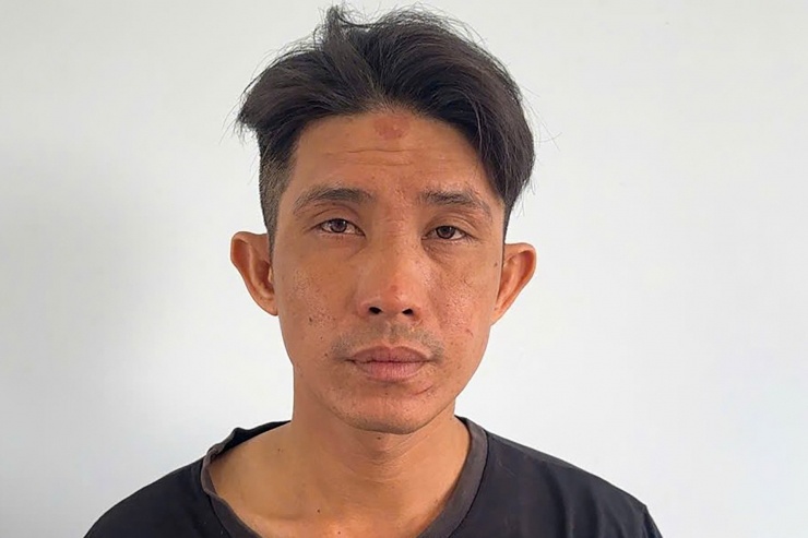 Nghi can Lê Văn Tuấn tại công an. Ảnh: X.N