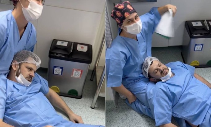 Pedroso được một y tá đỡ ở nách rồi quạt để dần tỉnh lại. Ảnh: Jam Press