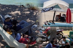 Ngày đầu nghỉ lễ, người dân trải bạt, mắc võng la liệt chờ tắm biển ở TP.HCM