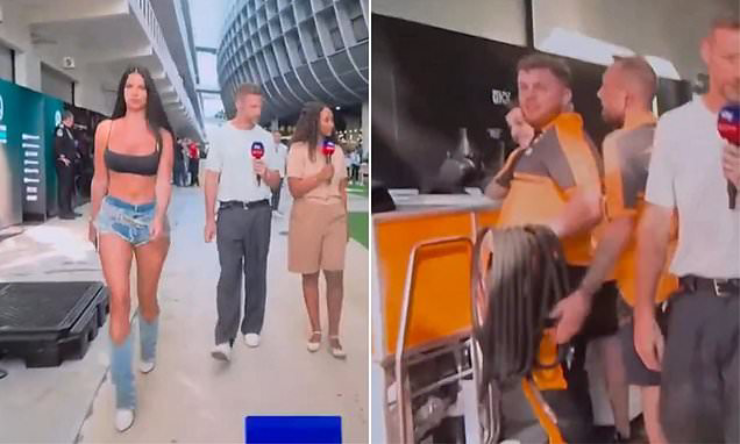 Camera thay vì quay vào&nbsp;Jenson Button thì lại chuyển cảnh sang cô nàng xinh đẹp đi qua