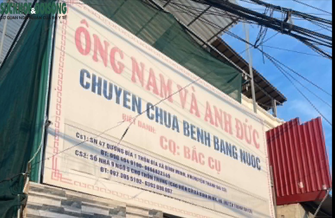 Biển hiệu cơ sở 'CHUYEN CHUA BENH BANG NUOC' của ông Nam và anh Đức tại thôn Đìa, xã Bình Minh, Hà Nội.