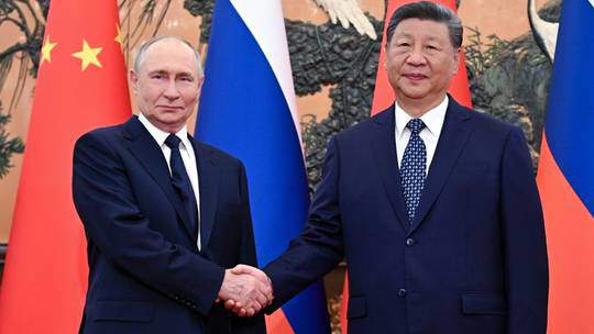 Tổng thống Nga Putin và Chủ tịch Trung Quốc Tập Cận Bình. Ảnh RT