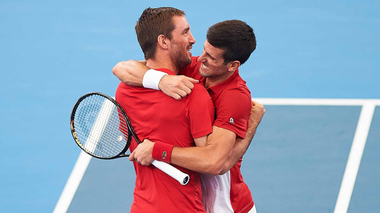 Troicki (bên trái) được chọn vì hiểu rõ Djokovic (bên phải)