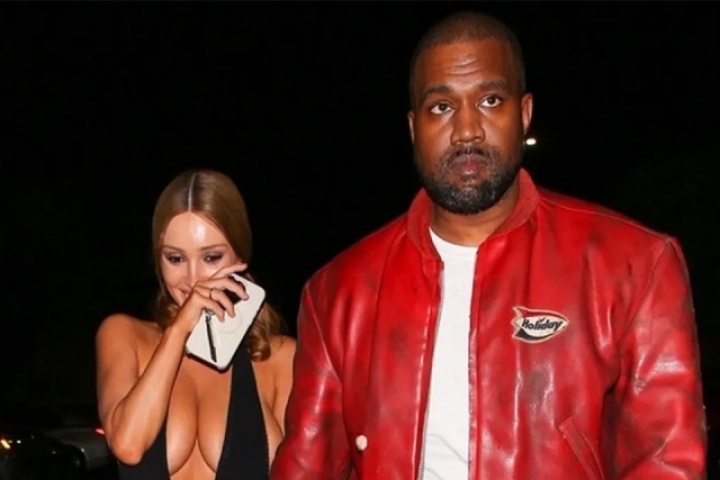 Vợ chồng Kanye West mặc nổi bật đi xem phim về Michael Jackson