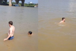 Anh Tây chịu thua cái nóng Hà Nội, đang cà phê 'chill' cũng xuống sông Đuống tắm
